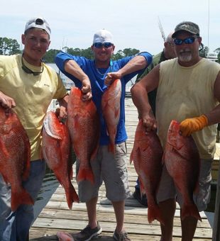 Reeling in Reds on Gulf Shores!